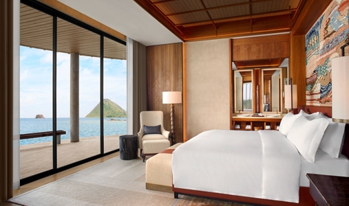 TA’AKTANA, a Luxury Collection Resort & Spa, Labuan Bajo - Overwater Villa Bedroom - Book on ClassicTravel.com