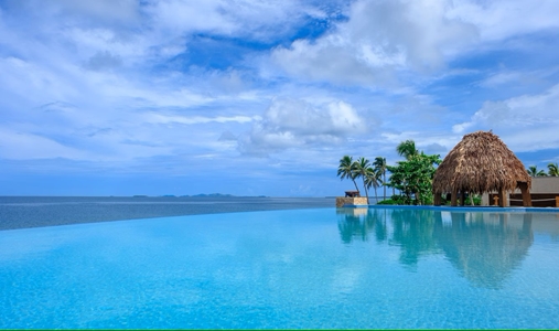 Fiji Marriott Resort Momi Bay - Sunset Outdoor Pool - Book on ClassicTravel.com